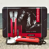 Red and silver liveryman black beauty clipper with black cord and battery pack in front of branded carrying case