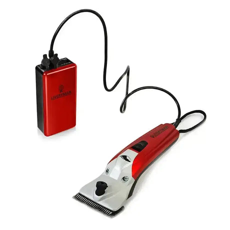 Red and silver liveryman black beauty clipper with black cord connected to matching red battery pack for cordless use