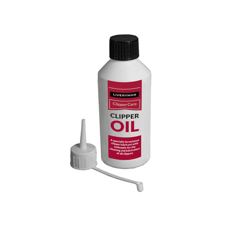 White plastic bottle of liveryman clipper oil clipper oil liquid with black cap red label and white applicator tip