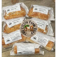 The little farm shop sausage roll wrapped in clear plastic with a white label on ljs pantry pasties product