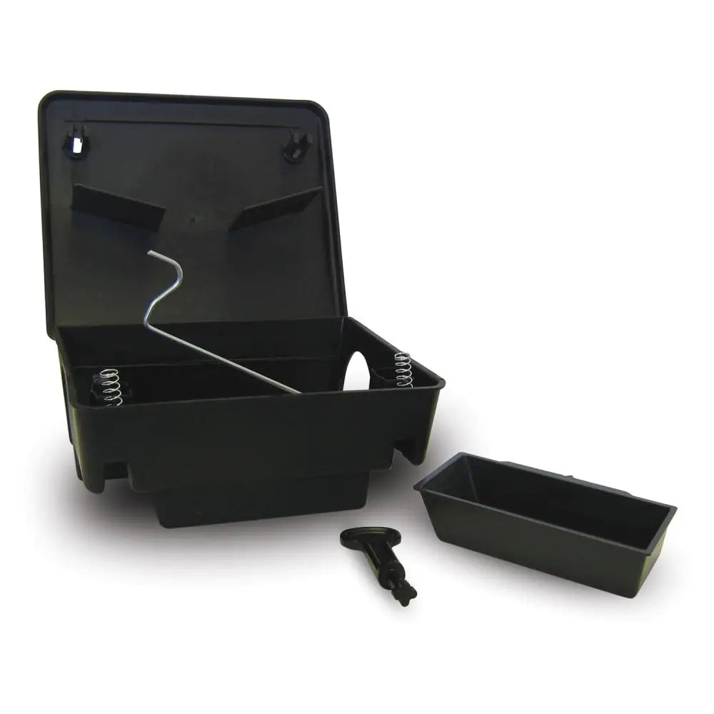 Black plastic snap-action mouse trap with metal spring and bait plate in lodi beta bait beta bait station for proven rodent bait