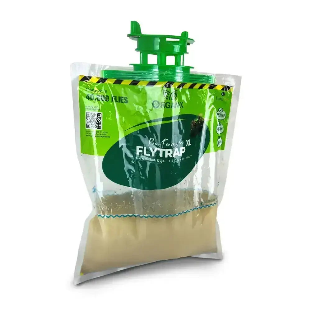 Green plastic lodi organ-x fly trap xl with clear bag of beige bait non-toxic solution for catching flies