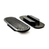 Black plastic lorina stirrup treads with ribbed and flat surfaces for sturdy rounded rubber foot pedals