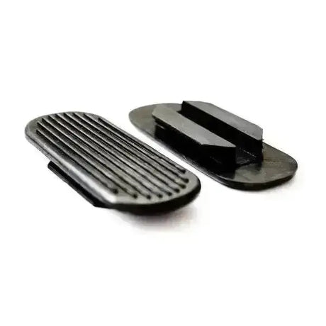 Black plastic lorina stirrup treads with ribbed and flat surfaces for sturdy rounded rubber foot pedals