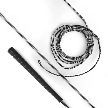 Black textured grip lunge whip black with braided black and white cord from signature products for balanced use