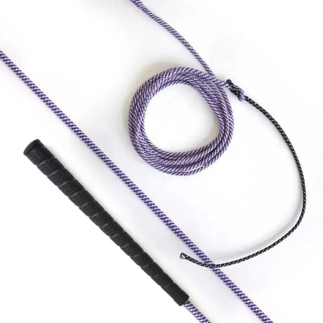 Purple and black braided lunge whip purple with textured black grip designed for balanced control and wholesale pallet orders