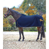 Navy blue mackey sponsor fleece rug with gold trim and fillet string knot detail for horse comfort and warmth