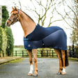 Navy blue mackey tara hybrid cooler horse blanket with black straps and logo patch for cooling and comfort