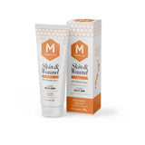 White tube and box of manuka vet skin and wound gel with orange honeycomb branding for skin abrasions care