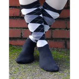 Mens rhinegold fully cushioned riding socks in black and white argyle with solid black toe and heel