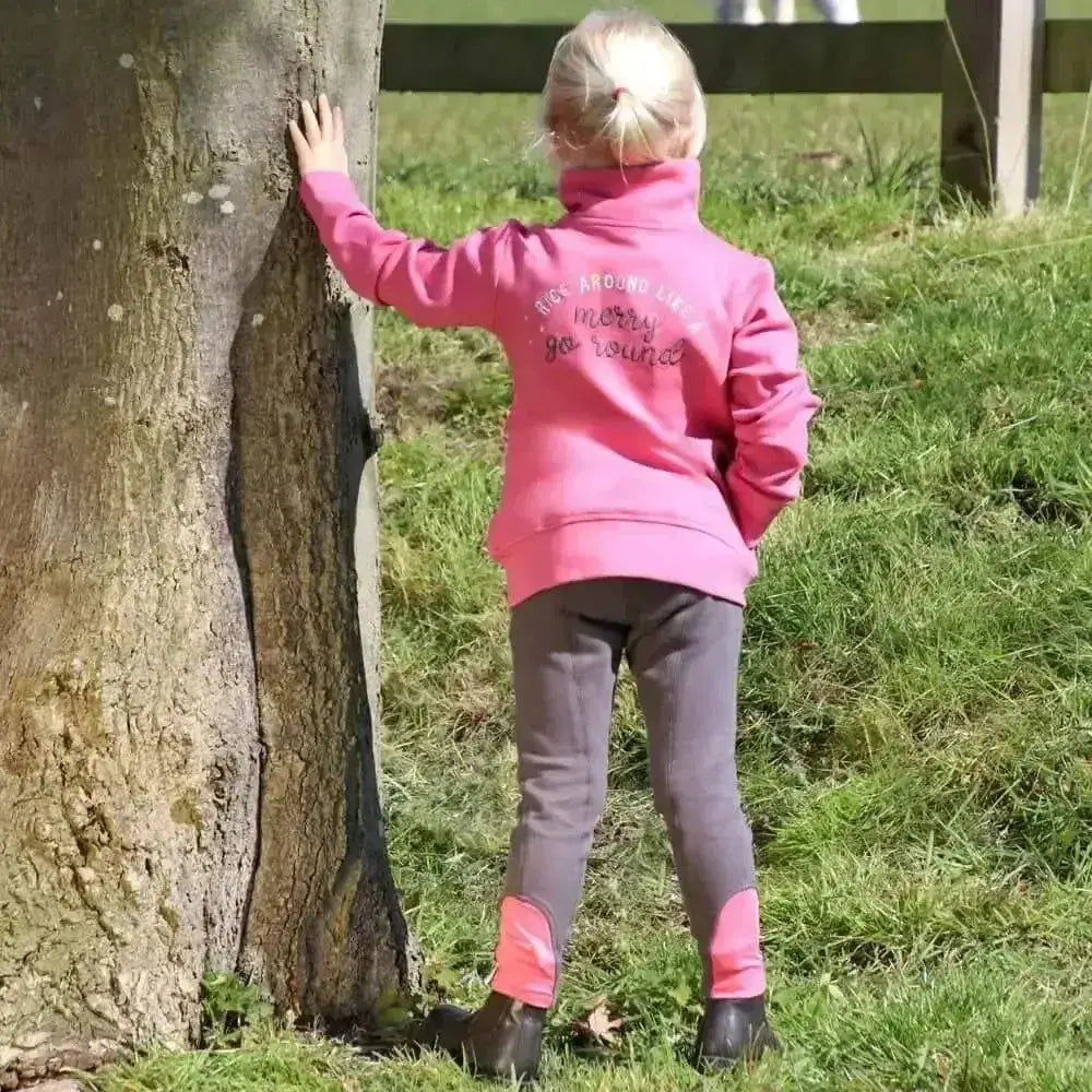 Back view of a vibrant pink fleece merry go round jacket by little rider with embroidered text perfect for outdoor coats