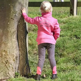 Back view of a vibrant pink fleece merry go round jacket by little rider with embroidered text perfect for outdoor coats