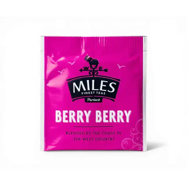 A vibrant pink berry envelope teabags packet from miles tea featuring the coffee berry flavor label