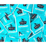 Bright turquoise miles tea envelope peppermint teabags with black branding and real peppermint leaves for fresh tea