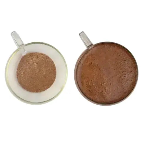 Two clear glass mugs with lighter and darker brown powder of miles heavenly hot coffee hot chocolate mix