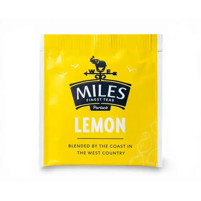 Bright yellow lemon envelope teabags from miles tea lemon with a black elephant logo and lemon verbena flavor