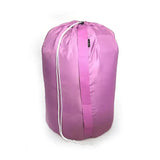 A sleek vibrant pink moorland rider hay versatile carry sack with white drawstring and subtle brand tag on the side