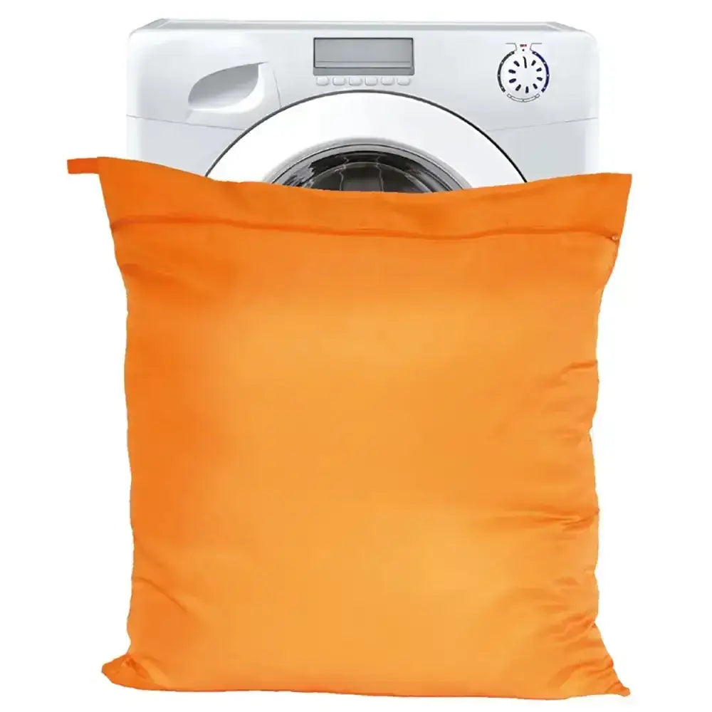Bright orange moorland rider horsewear horsewear wash-bag jumbo with drawstring top for loose horse hair in front of washing machine