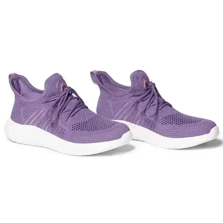 Purple knit mountain horse airflow sneaker with white soles and subtle stripes featuring shockx advanced insole