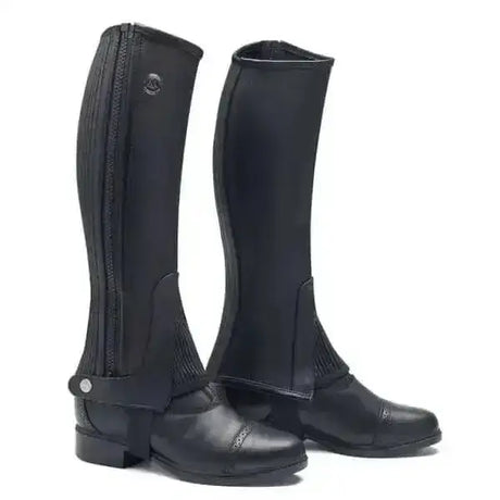 Black leather mountain horse chaps soft rider leggings with side zipper and metal buckle at the bottom