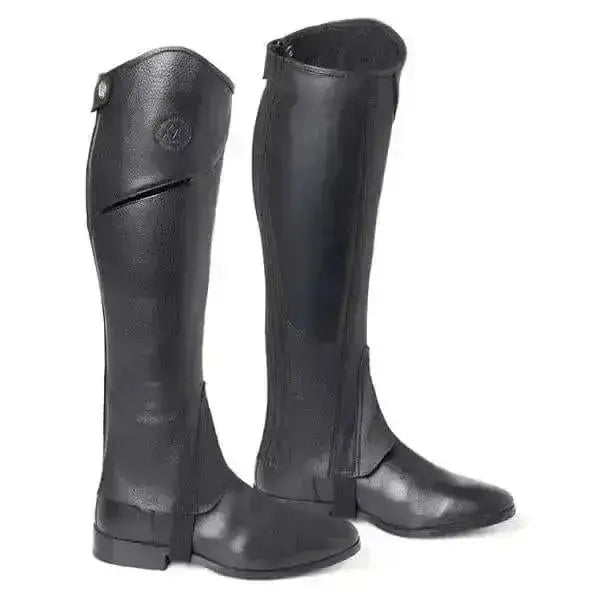 Black leather riding boots with glossy finish and reinforced stitching from mountain horse renown horse renown leggings