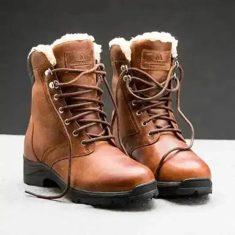 Brown leather mountain horse snowy river lace short riding boots with plush white shearling lining and black soles