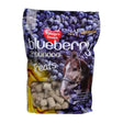 A bag of naf blueberry blueberry and banana horse treats with purple yellow design and brown horse image