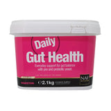 Pink and black labeled plastic container of naf daily gut powder to support digestive health for horses