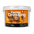 A white plastic tub of naf five star profeet farrier dressing 2.5kg for horse hooves with orange and black label