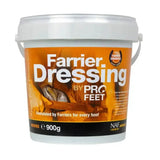 Orange-labeled white plastic bucket of naf five star profeet farrier dressing 900g for hoof care