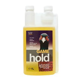 A clear plastic bottle with white cap filled with yellow naf game hold liquid for digestive health to hold game birds
