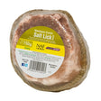 A pink himalayan salt lick wrapped in clear plastic with a yellow and white naf himalayan salt label