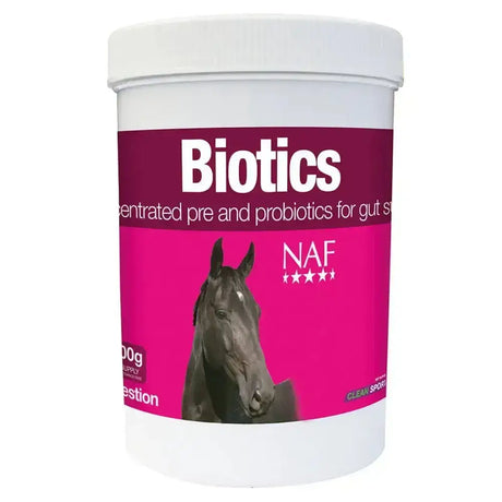 A white container with a pink label of naf instant biotics horse vitamins for gut balancers and natural microbial repopulation