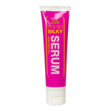 Bright pink tube of naf its so silky serum with white cap designed for silky hands and nails with abyssinian oil