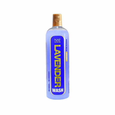 A translucent lavender naf lavender wash bottle with gold spray nozzle and blue label with bold yellow text for horse washes