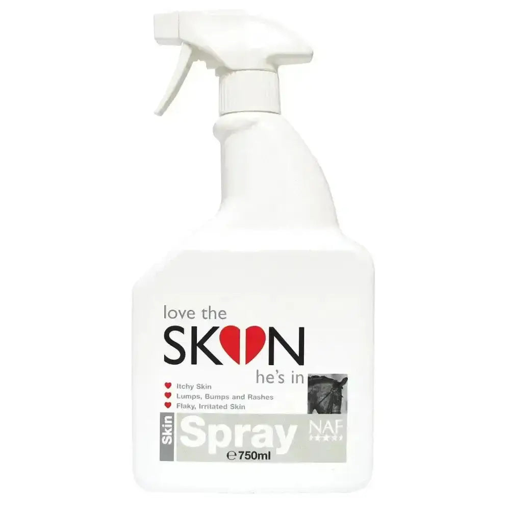 White plastic spray bottle with white trigger labeled love the skin hes in for anti itch sprays and healthy coat care