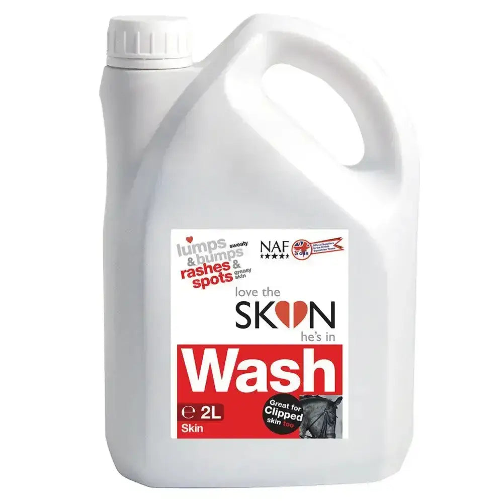 White plastic jug with screw-on cap and handle labeled NAF love the skin hes in premium natural skin wash for horse skin care