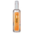 Clear plastic spray bottle with orange label and white nozzle for naf muck stain remover ideal for stubborn stable stains and horse grooming