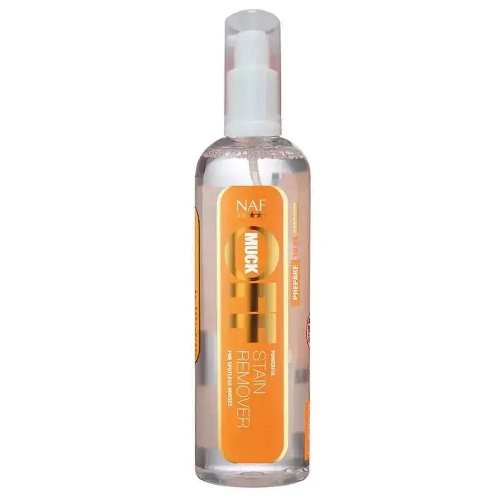 Clear plastic naf muck spray bottle with orange label gold lettering for stubborn stable stains in horse grooming