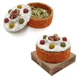 Orange and white textured hay feeder topped with colorful decorative balls in naturals celebration cake x6 set