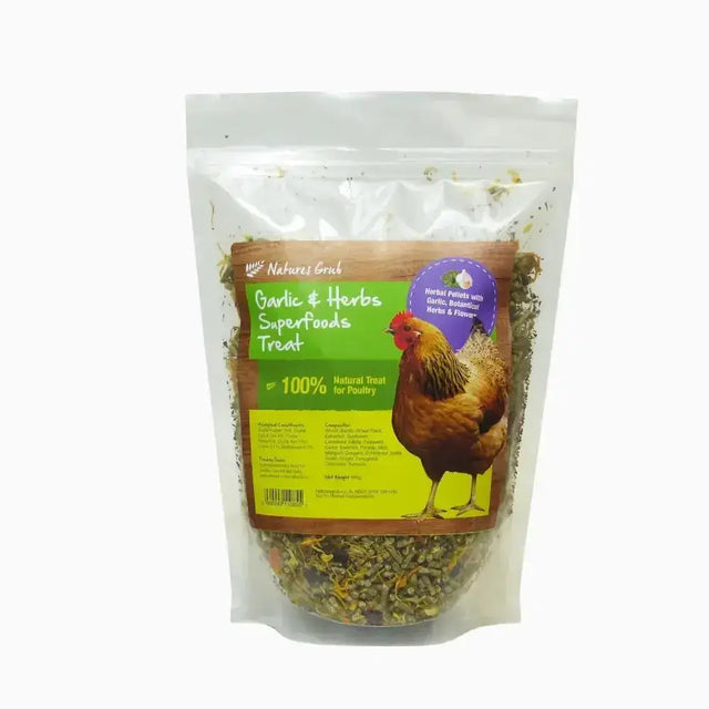 A clear plastic bag of green and brown herbal pellets labeled natures grub garlic herb superfoods treat for poultry health boosting treat