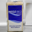 A 20 kg package of nedz bed original bedding material with a blue and white wavy label design