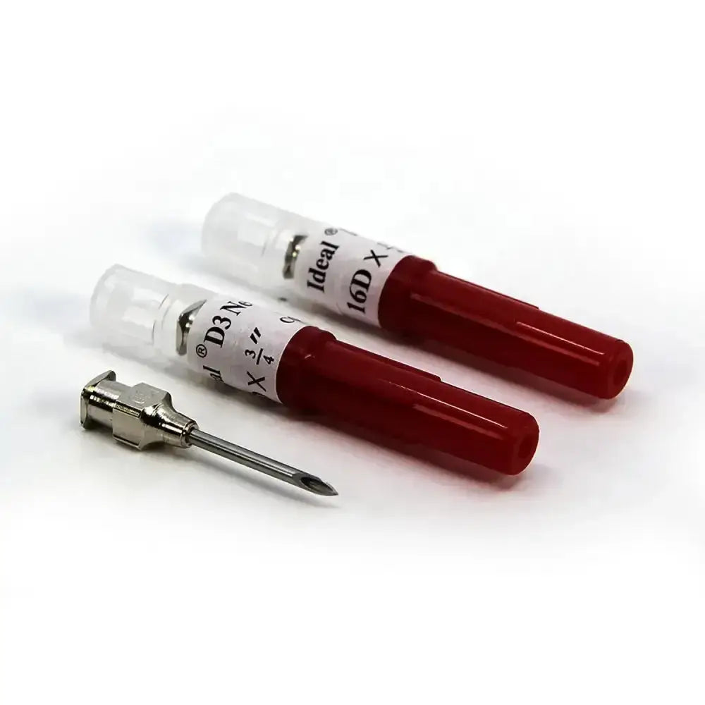 Red plastic-capped neogen d3 detectable needles with plated brass hubs and white labeling to reduce breakage six-fold