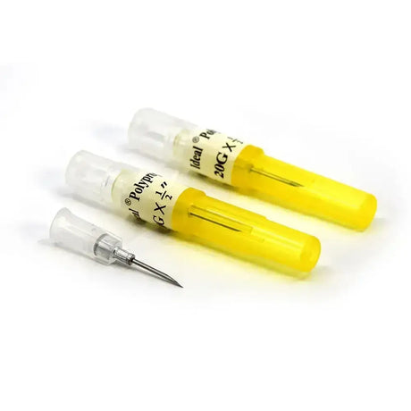 Yellow neogen disposable needles with 20g polypropylene hub for young animal administration with clear caps and metal tips