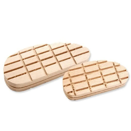 Two light brown wooden soap dishes with grid pattern shown for neogen hoof block designed to reduce bovine lameness