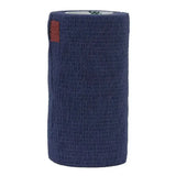 Dark blue textured neogen syrflex bandage roll with small brown label offers consistent lightweight compression and cohesive fit