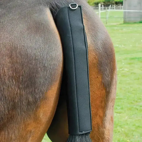Black padded neoprene tailguard by Rhinegold with breathable material and metal d-ring for secure touch tape fastening