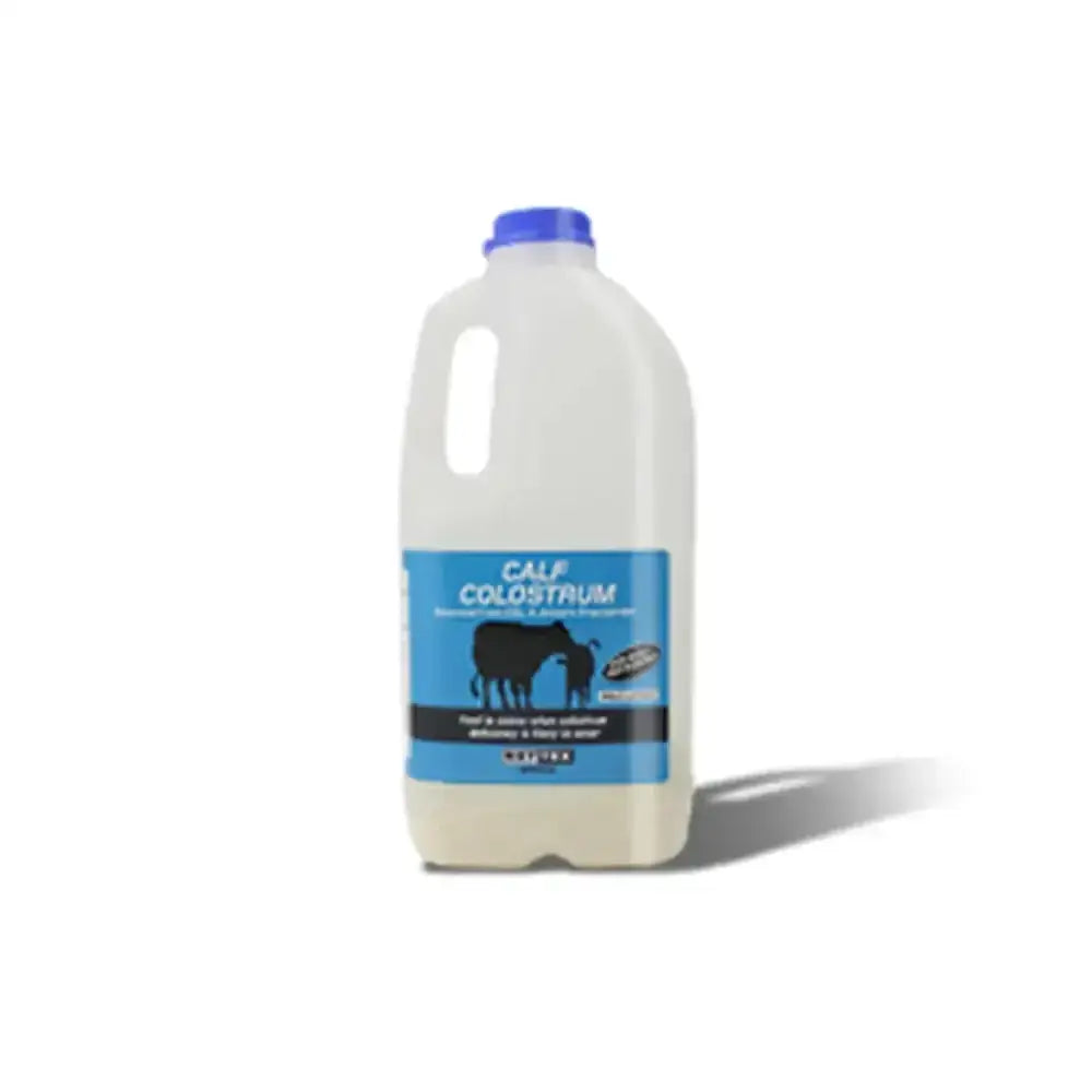 A white plastic jug with blue cap labeled nettex agri calf fat colostrum supplement showing a cow and calf illustration