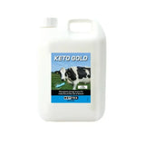 White plastic jug of nettex agri keto gold with blue and black label featuring a black and white cow for glucogenic energy source