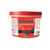 Red and white plastic bucket with red lid of nettex agri marksman scourable marking paste for sheep use